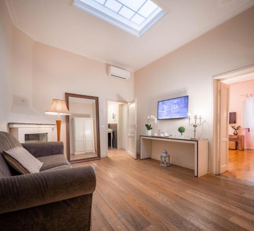 TV a/nebo společenská místnost v ubytování Boutique Hotel del Corso