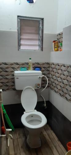 Koupelna v ubytování Sakshi Home Stay