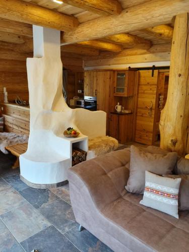 Posezení v ubytování Almzauber Chalets - Haus Enzian inkl Infrarotliegen