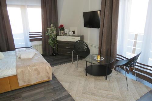 Μια τηλεόραση ή/και κέντρο ψυχαγωγίας στο ApartPodhale