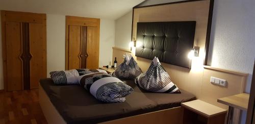 Postel nebo postele na pokoji v ubytování Ferienhaus Alpenroyal