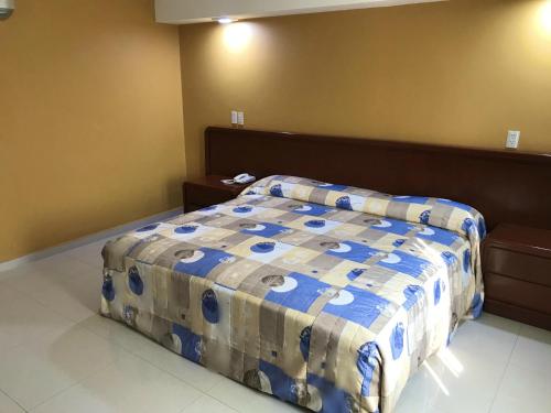 Cama o camas de una habitación en Hotel Villas Dali Veracruz