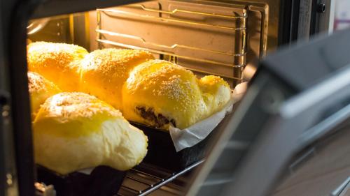 a group of bread in an oven at Pensiunea Tara Fagilor in Suceava