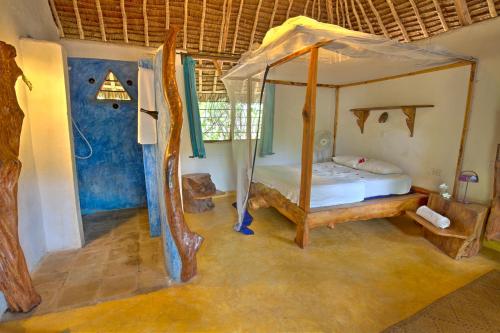 Voodi või voodid majutusasutuse Distant Relatives Ecolodge & Backpackers toas
