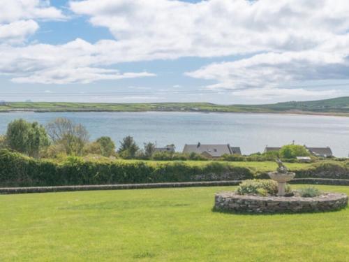 a park with a view of a body of water at Beachmount House in Ventry