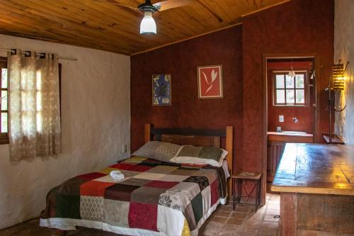 Ένα ή περισσότερα κρεβάτια σε δωμάτιο στο Espaço João Mineiro
