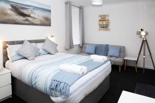 Un ou plusieurs lits dans un hébergement de l'établissement Marina View Guest House