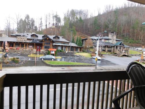 a balcony with a view of a parking lot at Days Inn & Suites by Wyndham Downtown Gatlinburg Parkway in Gatlinburg