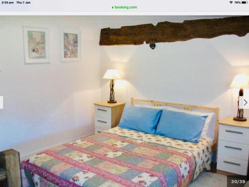 Ένα ή περισσότερα κρεβάτια σε δωμάτιο στο Maison Mai or La Petite Maison Mai or La Petite Grange or ALL three