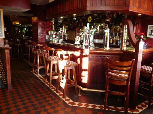 Ο χώρος του lounge ή του μπαρ στο Murphy's Pub and Bed & Breakfast