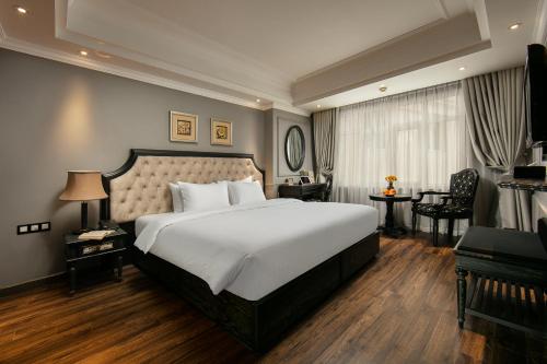Postel nebo postele na pokoji v ubytování Scent Premium Hotel