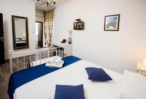 Posteľ alebo postele v izbe v ubytovaní Prior Suites Split