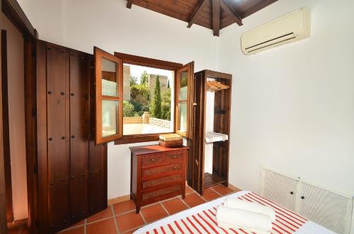 Una cama o camas en una habitación de Loft Dar al- Horra , Terraza, parking & Vistas