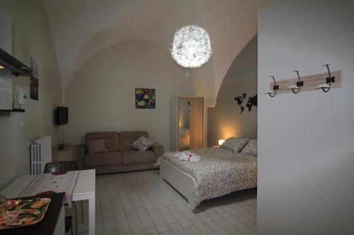 A bed or beds in a room at Guest House Orsini