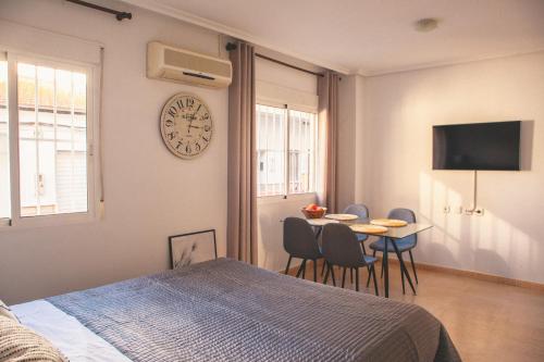 TV a/nebo společenská místnost v ubytování Aparthotel Costa Blanca