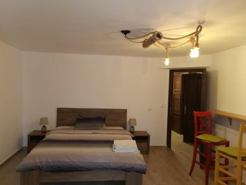 En eller flere senger på et rom på Vila Ines