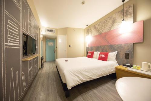 Cama o camas de una habitación en Ibis Tianjin Teda