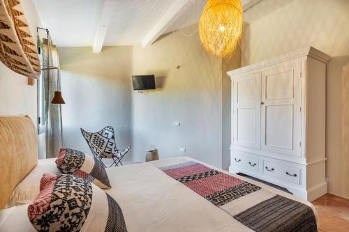 Postel nebo postele na pokoji v ubytování Hotel & Glamping Borgo di Campagna
