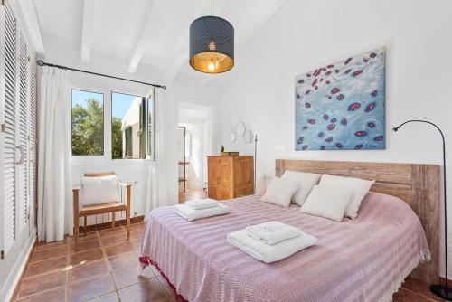 Llit o llits en una habitació de Villa Sirena - Cap den Font