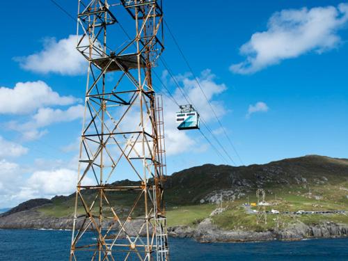 a ski lift tower in the middle of the ocean at Island View Cottage Bantry by Trident Holiday Homes in Bantry