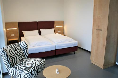 Postel nebo postele na pokoji v ubytování Hotel No151