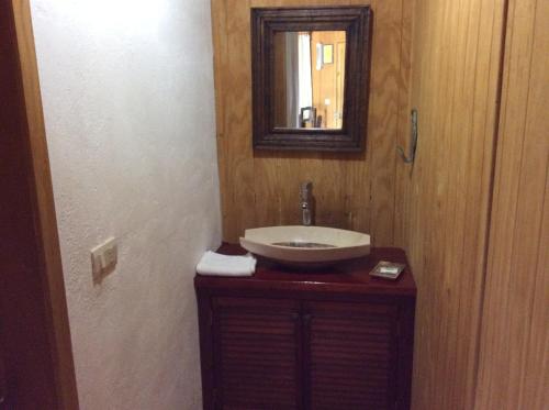 Ванная комната в Cabanas la Chicharra