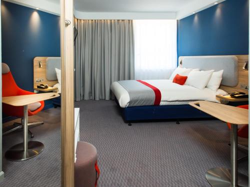 a hotel room with a bed and a desk at Holiday Inn Express Burton on Trent by IHG in Burton upon Trent