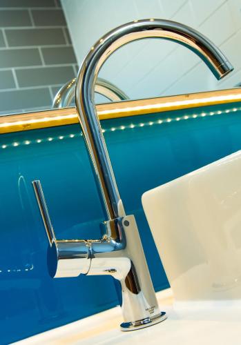 a bathroom sink with a chrome faucet at Holiday Inn Express Burton on Trent by IHG in Burton upon Trent
