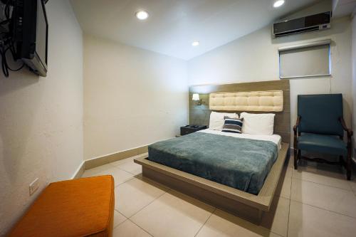 Voodi või voodid majutusasutuse Coral Suites toas
