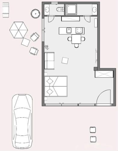 a floor plan of a house with a car at FeWo Dansenberg in Kaiserslautern