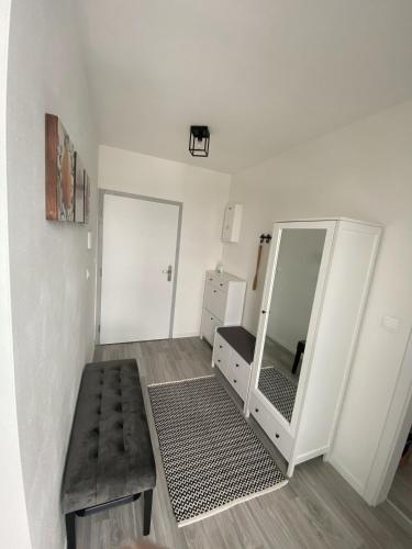 Ένα ή περισσότερα κρεβάτια σε δωμάτιο στο GNG Apartment