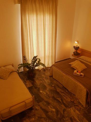 Letto o letti in una camera di HOTEL ROMANTICA
