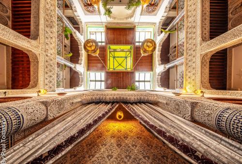 a view of a spiral staircase in a building at Riad Fes Nass Zmane in Fès