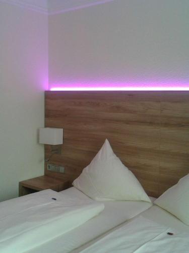 Katil atau katil-katil dalam bilik di Hotel Jedermann