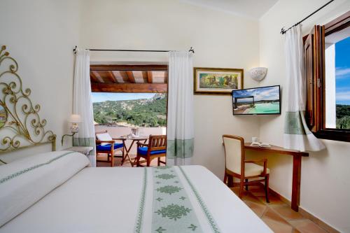 Ένα ή περισσότερα κρεβάτια σε δωμάτιο στο Felix Hotels - Country Resort Parco degli Ulivi