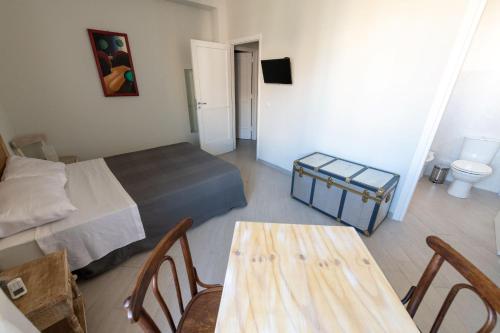 TV a/nebo společenská místnost v ubytování " DOMUS CORALLA" BnB Racconti Di Viaggio
