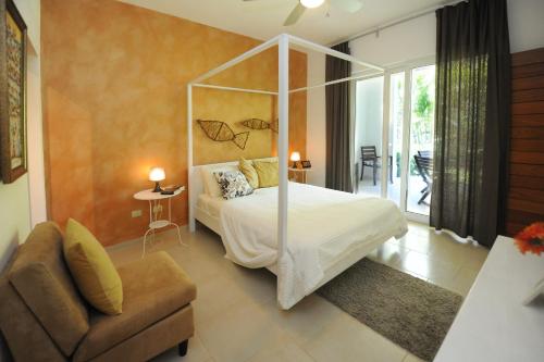 Ein Bett oder Betten in einem Zimmer der Unterkunft Instyle Residences at Infiniti Blu