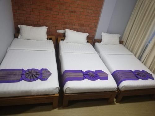 Кровать или кровати в номере The Pegu Lodge