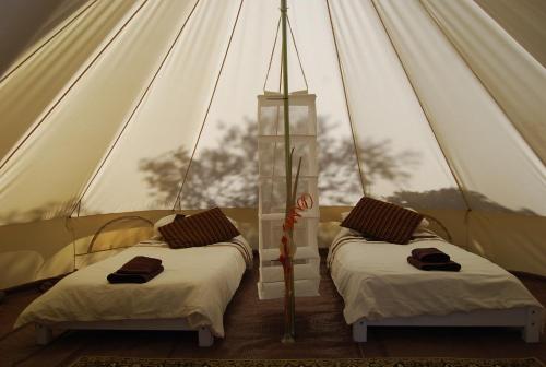 Säng eller sängar i ett rum på Hidden Valley Andalucia