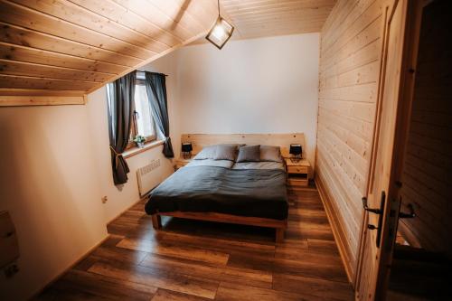 Postel nebo postele na pokoji v ubytování Holickie Berdo