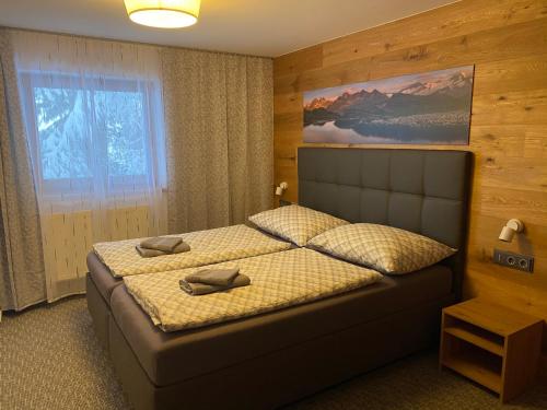 Postel nebo postele na pokoji v ubytování Pension Marina