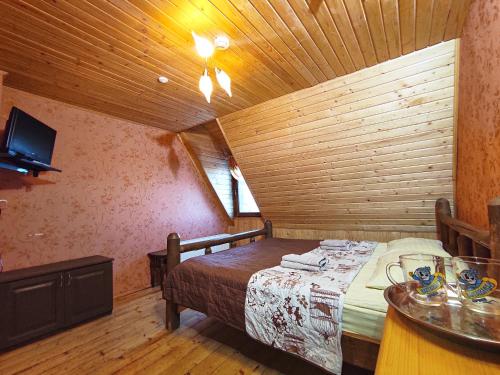 En eller flere senge i et værelse på Votaviliu