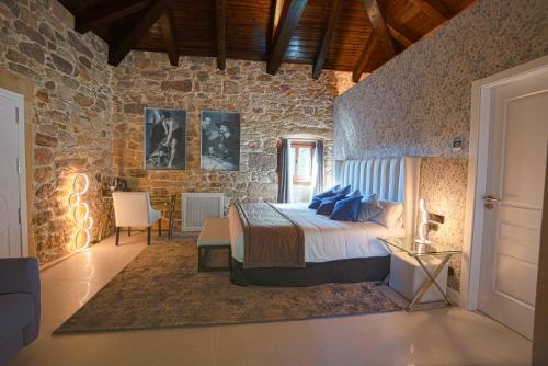 Posteľ alebo postele v izbe v ubytovaní Hotel As Torres da Hermida