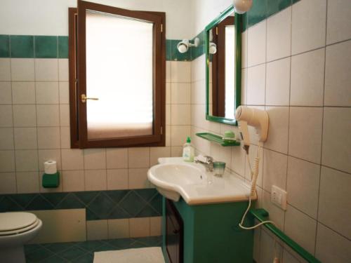 A bathroom at B&B Nel Giardino In Fiore