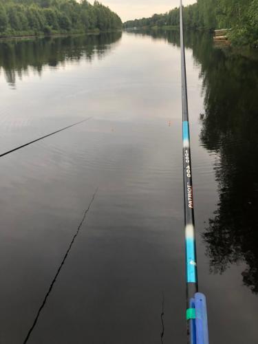 a pole in the middle of a river at Arctic Resort Delight in Rovaniemi