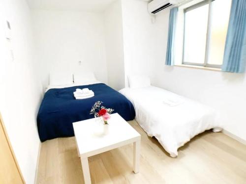Katil atau katil-katil dalam bilik di Sunstay - Higashi-Nakano