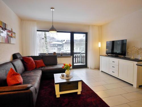 Μια τηλεόραση ή/και κέντρο ψυχαγωγίας στο Ferienwohnung Nelly am Kurpark