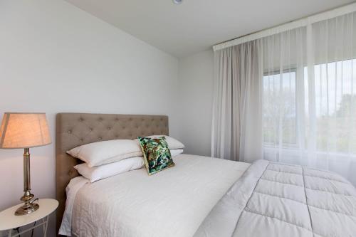 Postel nebo postele na pokoji v ubytování Peria Hills Cottage