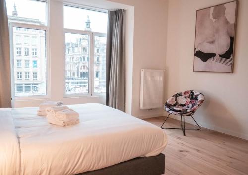 Кровать или кровати в номере Smartflats - Antwerp View