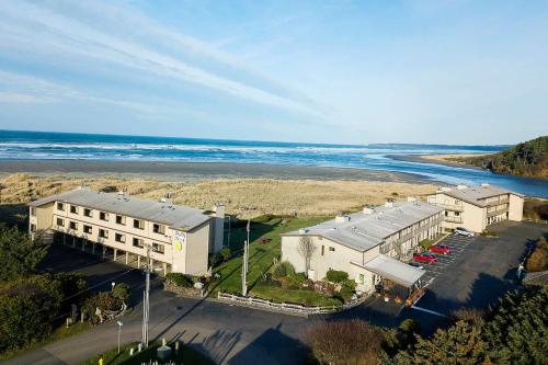 an aerial view of a building next to the ocean at Hi-Tide Resort in Moclips